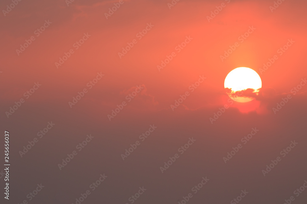 Sunset orange and red colors landscape, sea and sun with deep sky background..Red Sea, Egypt, Africa. Evening sunset view with clouds sky. Vacation at summer time. Sunrise morning beauty of nature