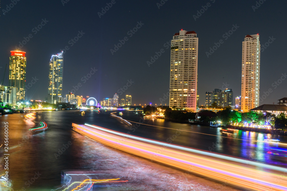 blur light of boat moving at the river of City