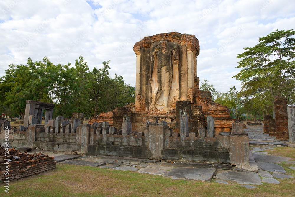 The ruins of the ancient Buddhist temple of Wat Chetupon on a cloudy morning. Sukhothai, Thailand