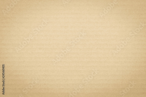 Light yellow brown cream color corrugated cardboard paper texture patterned background