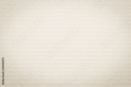 Carton board in light cream beige brown color with corrugated cardboard paper texture background