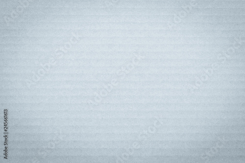 Recycled cardboard textured grunge detailed backdrop in light pastel selenium grey color