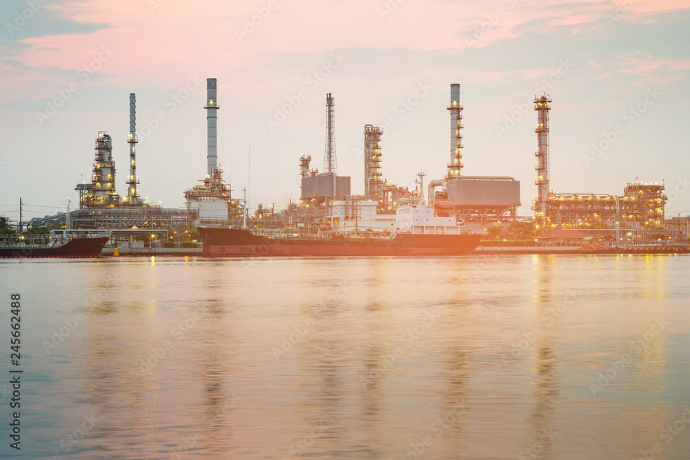 Oil refinery river front, petroleum industry background