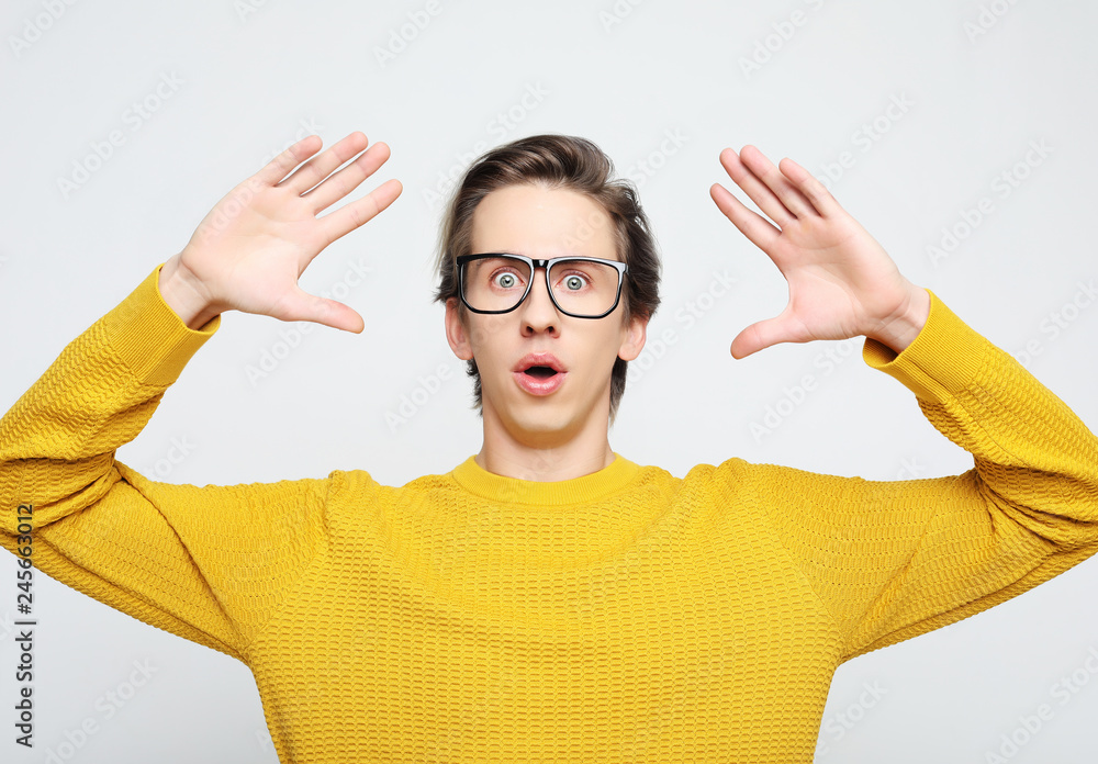 Astonished young crazy man feels stress. Astonished young crazy man feels stress.
