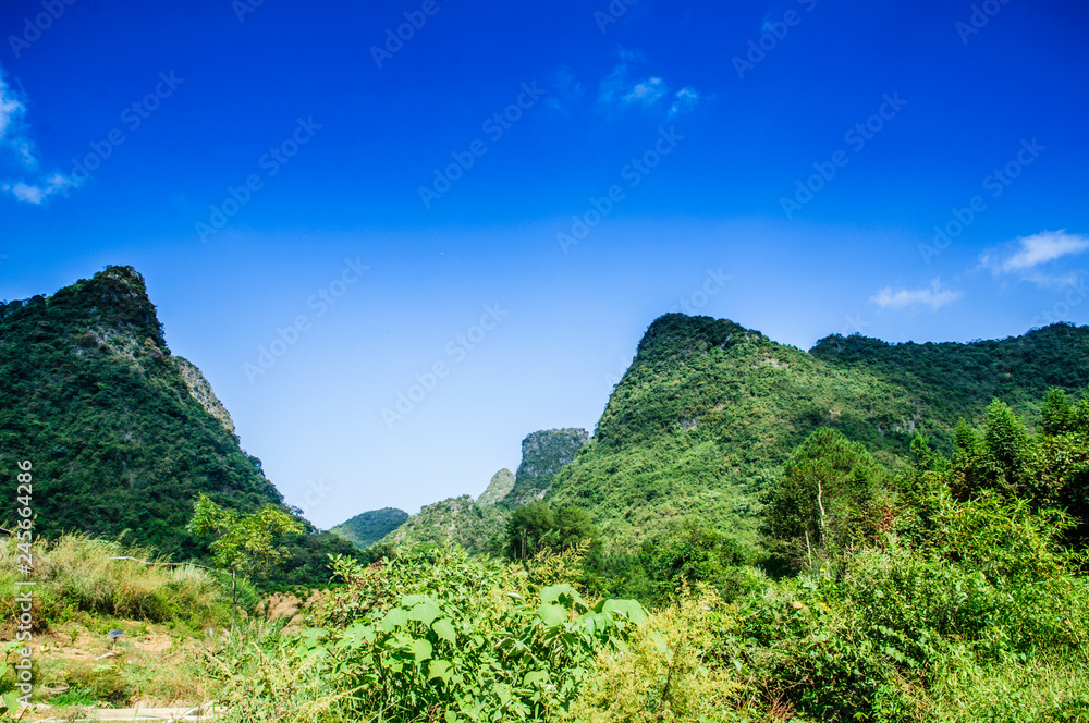 Karst mountains scenery with blue sky background