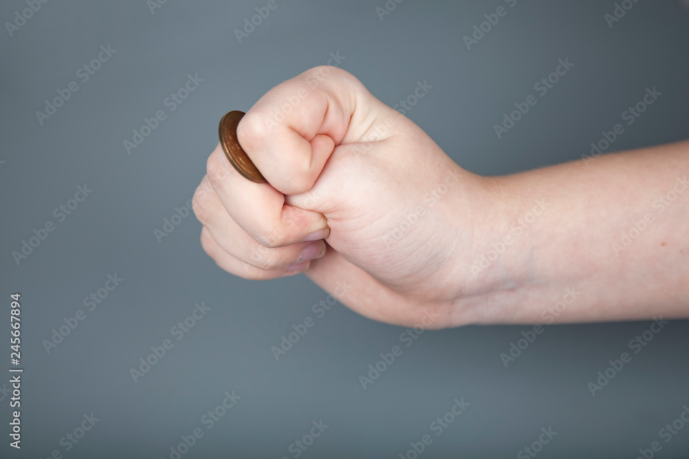 Hand with a coin Hand with a coin