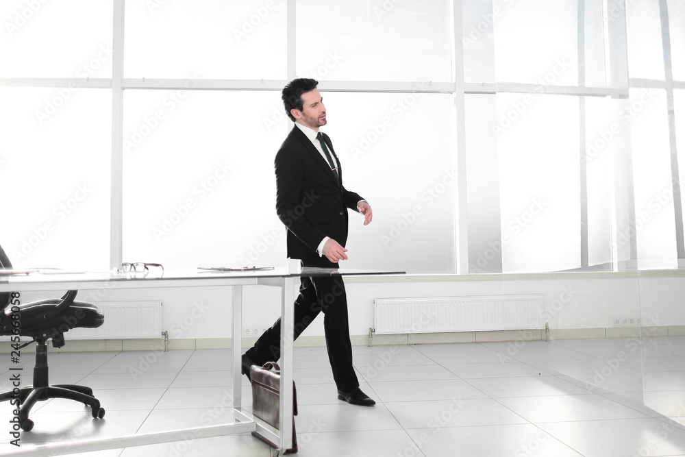 confident businessman in his office confident businessman in his office