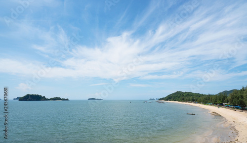 beautiful scenery with wood boat on the beach white sand in blue sea and blue sky on tropical beach  .