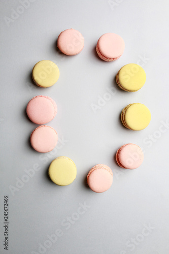 Alphabet letters made of sweet french macaroons.