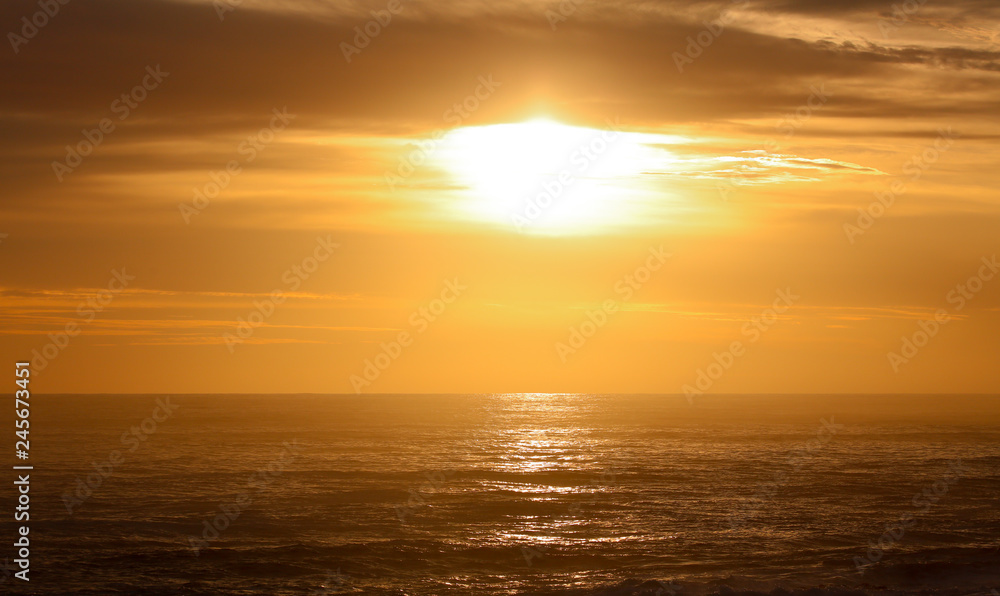 sun burst over ocean