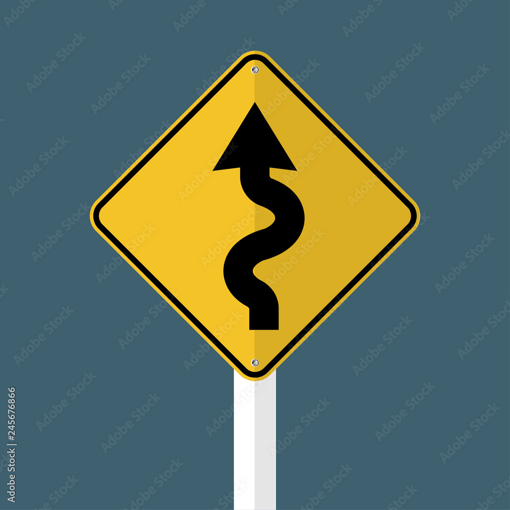 Left winding road Sign isolated on grey sky background.Vector illustration Left winding road Sign isolated on grey sky background.Vector illustration