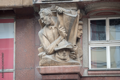 Facade sculptures of old Rondocubism building in Prague, Czech Republic.