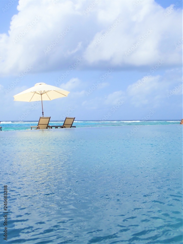 Beautiful beach and pool in Maldive island resort