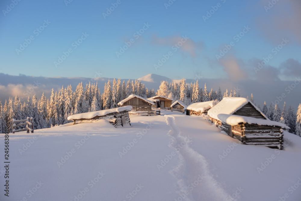 Wonderful morning in the mountainous valleys with houses in the Ukrainian Carpathians. Wonderful morning in the mountainous valleys with houses in the Ukrainian Carpathians.