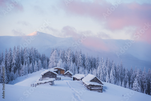 Wonderful morning in the mountainous valleys with houses in the Ukrainian Carpathians.