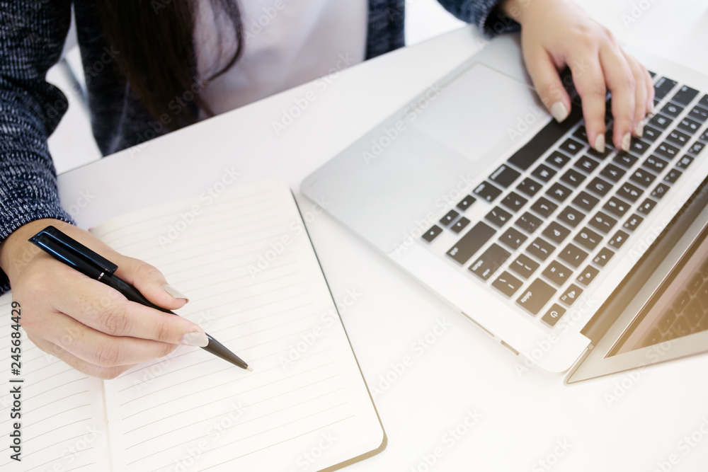 woman investor working on project plan woman investor working on project plan