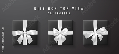 Black gift box with white, silver bow and ribbon top view. Element for decoration gifts, greetings, holidays. Vector illustration