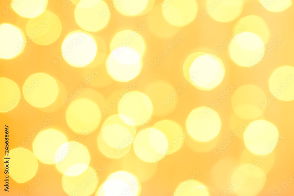 Bright orange bokeh background from warm light Bright orange bokeh background from warm light