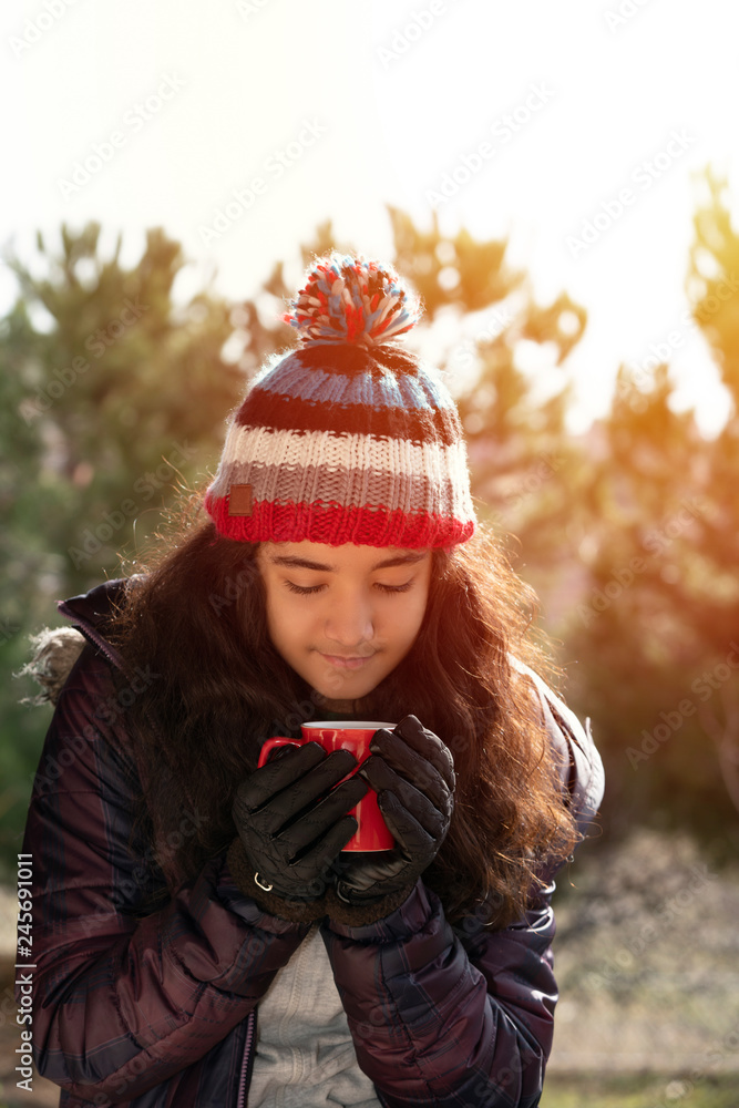 smiling girl at forest in winter smiling girl at forest in winter