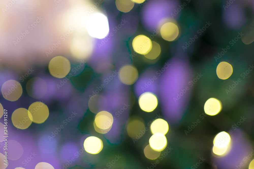 Out of focus texture background of Christmas tree with ornaments and Christmas lights. Out of focus texture background of Christmas tree with ornaments and Christmas lights.