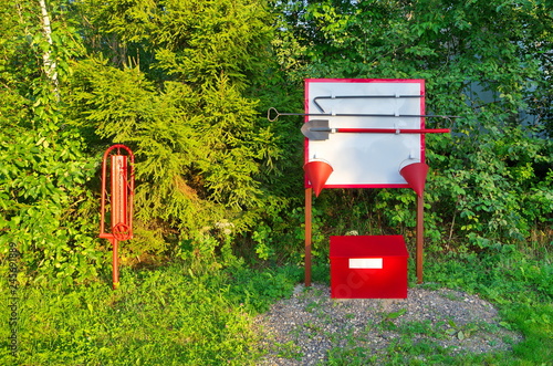 Fire shield with equipment, fire Rynda and a box with sand photo