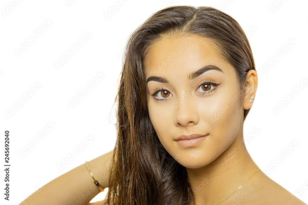 Mixed race young woman face portrait isolated on white background. Mixed race young woman face portrait isolated on white background.