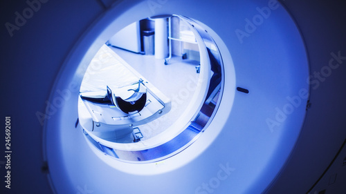 CT examination in the process. Detail of MRI scanner photo