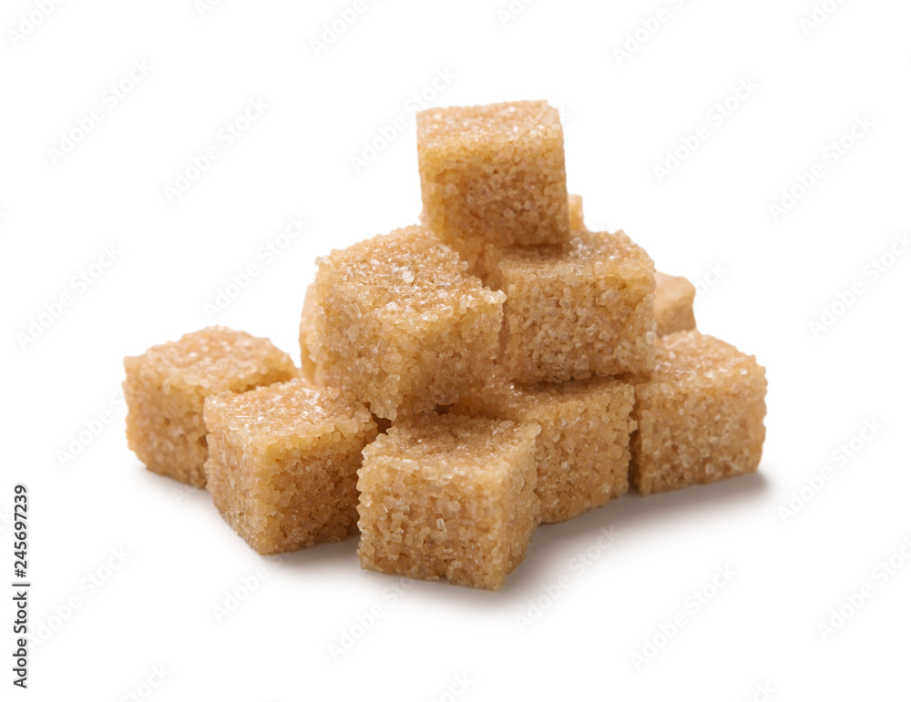 Heap of cane sugar cubes isolated on white background Heap of cane sugar cubes isolated on white background