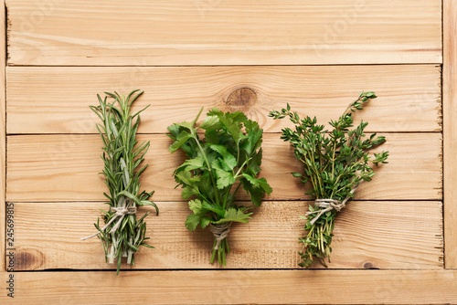 Bunch of rosemary, coriander and thyme, organic plants for healthy food