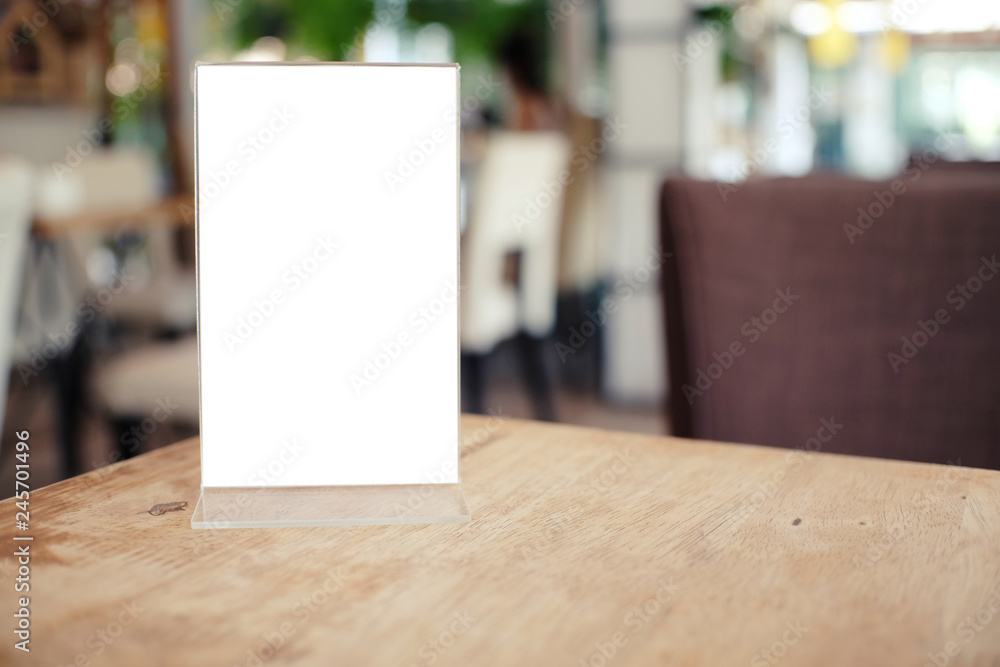 Menu frame standing on wood table in Bar restaurant cafe. space for text marketing promotion. Menu frame standing on wood table in Bar restaurant cafe. space for text marketing promotion.
