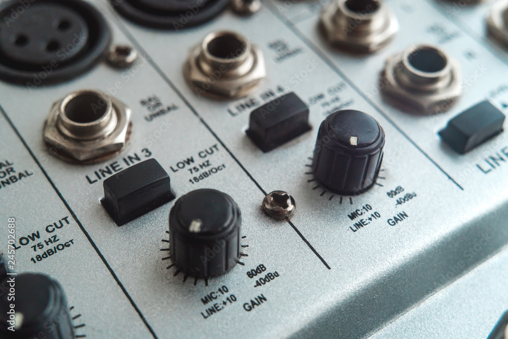 Photo of the analog mixer of the sound producer close up Photo of the analog mixer of the sound producer close up
