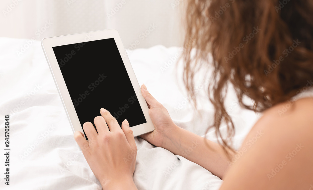 Woman using mobile smartphone with blank screen Woman using mobile smartphone with blank screen