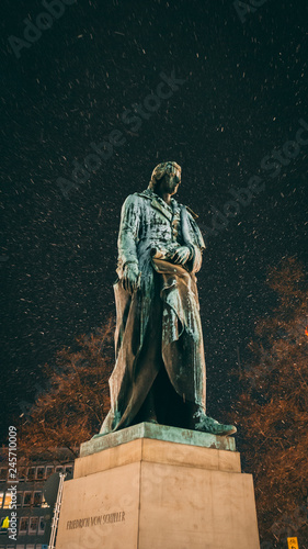 snow in hannover with statue of schiller