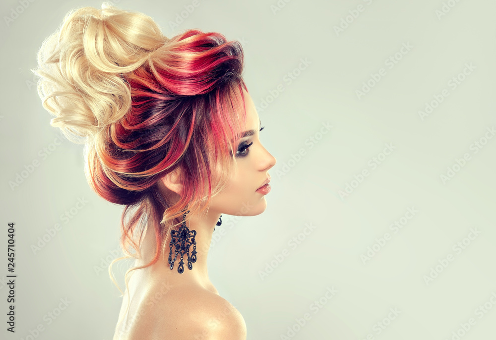 Beautiful model girl with elegant multi colored hairstyle . Stylish Woman  with fashion hair color highlighting. Creative red and pink roots , trendy  coloring. Stock Photo | Adobe Stock