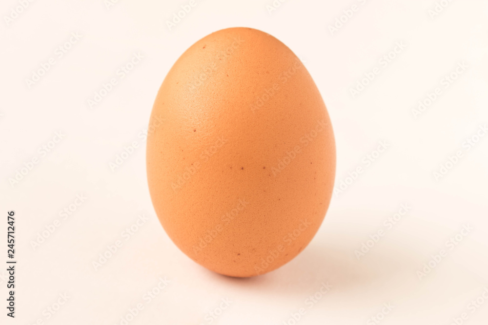 Chicken egg isolated on white background. Close up. Chicken egg isolated on white background. Close up.