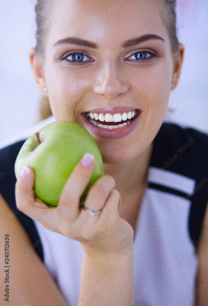 Close up portrait of healthy smiling woman with green apple. Close up portrait of healthy smiling woman with green apple.