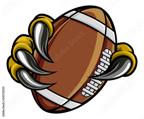 Eagle, bird or monster claw or talons holding an American football ball. Sports graphic.