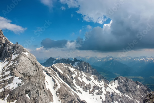 On peak of Dachstein and view alpine mountains