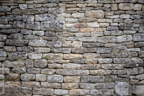 Muro in pietra grigia photo
