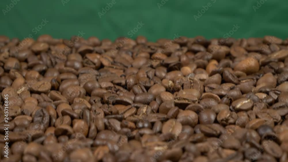 Fried of coffee beans on green screen slider shot close-up 4k apple prores 10bit Fried of coffee beans on green screen slider shot close-up 4k apple prores 10bit