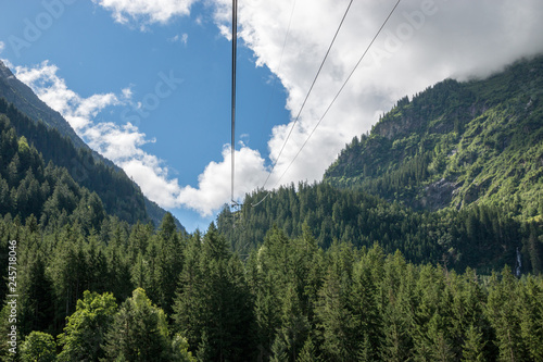 Closeup mountains scenes, cable car to Trift Bridge in national park Switzerland © TravelFlow