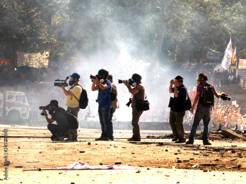 Foto Journalists taking photos of protests