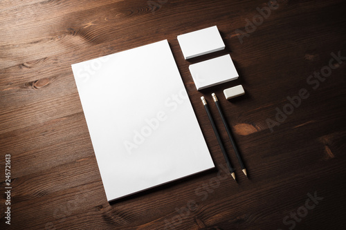 Photo of blank stationery set on wooden background. Corporate identity mockup. Responsive design template.