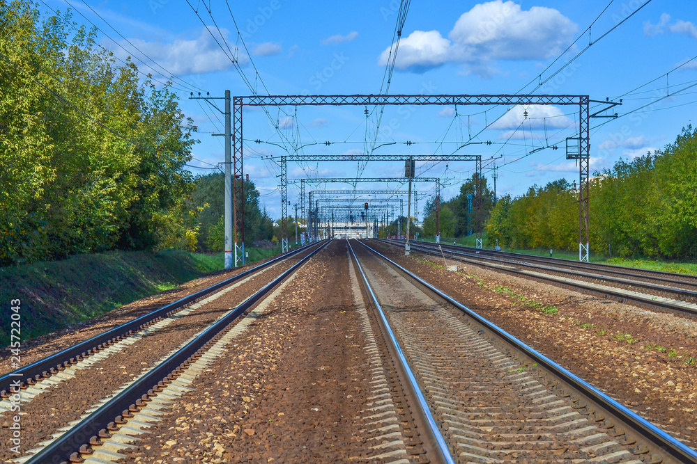 A lot of railway tracks stretching into the distance. Electrified road. Moscow region, Russia A lot of railway tracks stretching into the distance. Electrified road. Moscow region, Russia