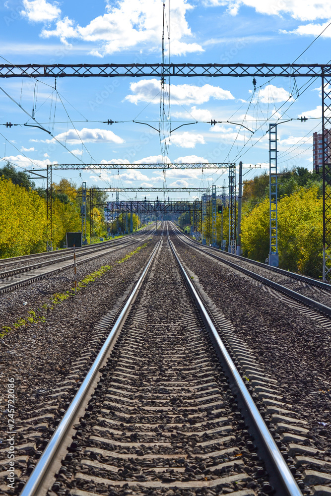 A lot of railway tracks stretching into the distance. Electrified road. Moscow region, Russia A lot of railway tracks stretching into the distance. Electrified road. Moscow region, Russia