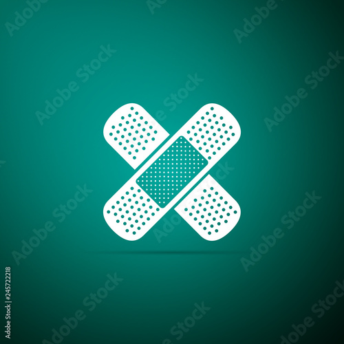 Bandage plaster icon isolated on green background. Medical plaster, adhesive bandage, flexible fabric bandage. Flat design. Vector Illustration