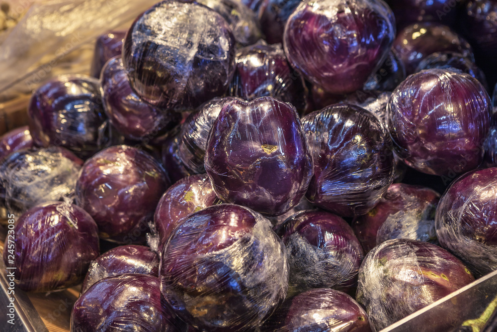 Natural Vegetables on Market Counter. Round Eggplant, aubergine Natural Vegetables on Market Counter. Round Eggplant, aubergine