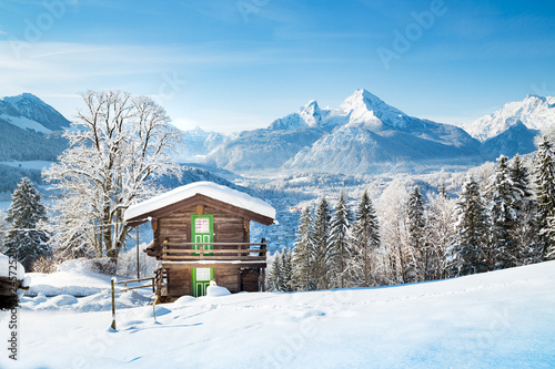 Traditional mountain hut in the Alps in winter