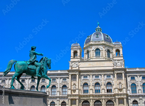 Vienna, Austria, architecture. The Natural History Museum and bronze horseman, clear blue sky. It is an example of Viennese architecture in the city’s historicism tradition.