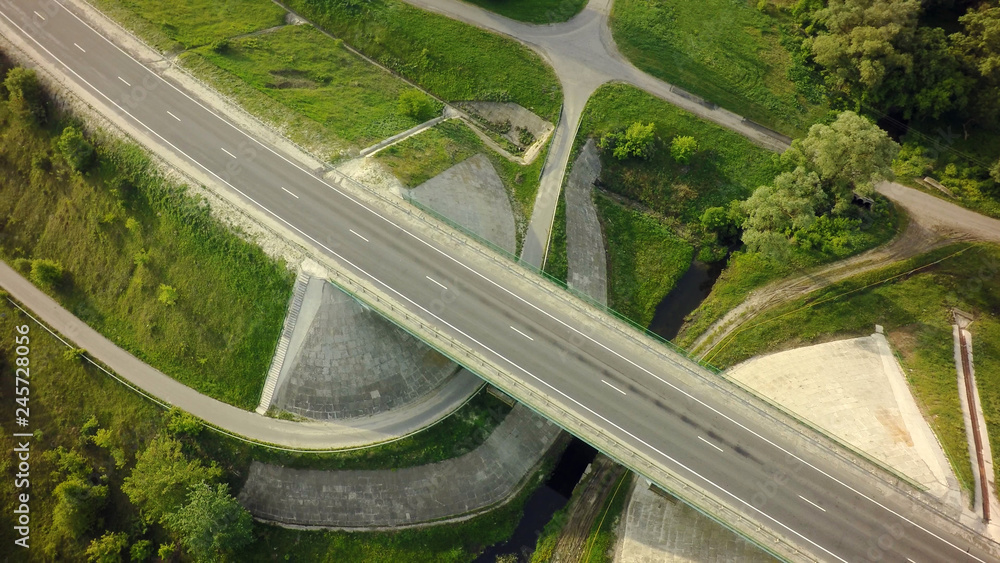 Aerial Top View of highway intersection junction summer morning